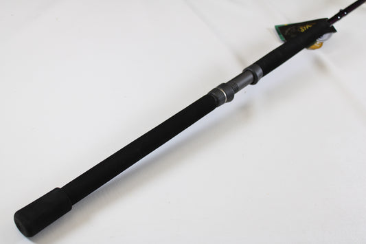 A close-up of a St. Croix Mojo Salt MSWC76MHMF 7'6" Medium Heavy used casting rod in mint condition shows its black foam handle on a white surface—perfect for those considering our Rod and Reel Trade-In Program.