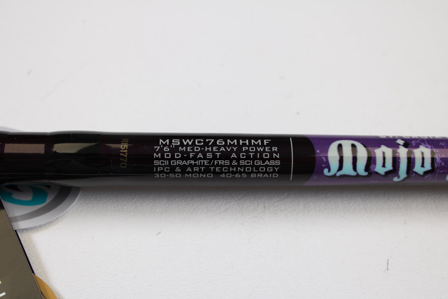 A close-up of a St. Croix Mojo Salt MSWC76MHMF 7’6” Medium Heavy Used Casting Rod in mint condition—ideal for our Rod and Reel Trade-In Program or to earn store credit on used St. Croix gear.