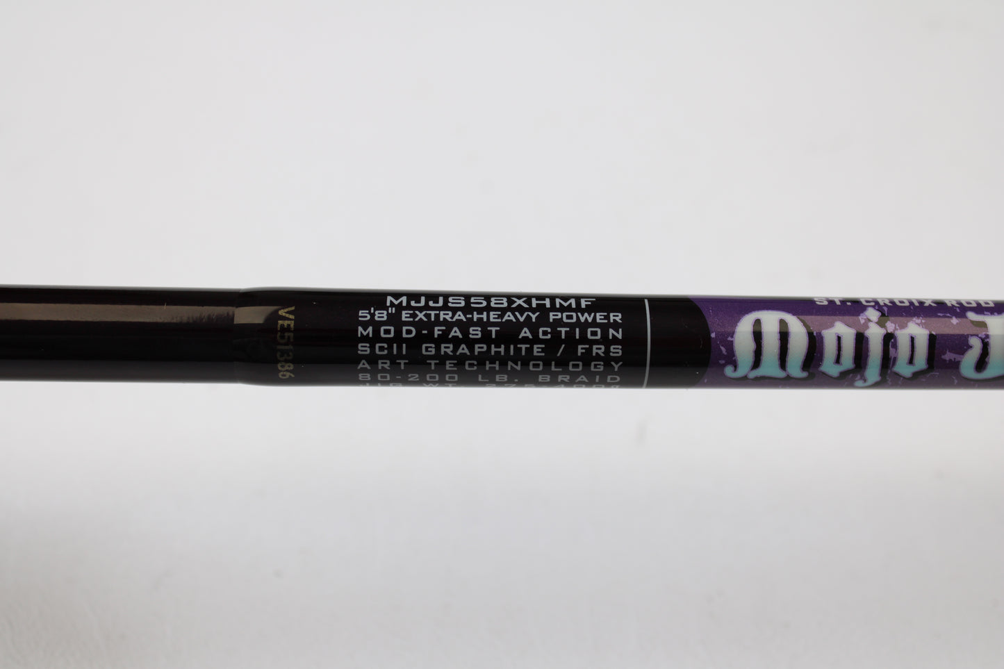 Close-up of a St. Croix Mojo Jig MJJS58XHMF 5'8" Extra-Heavy Mod-Fast spinning rod (used, mint). SCII Graphite/FRS, ART Technology, 80-200 lb. braid—perfect for your next rod and reel trade-in or quality used gear search.