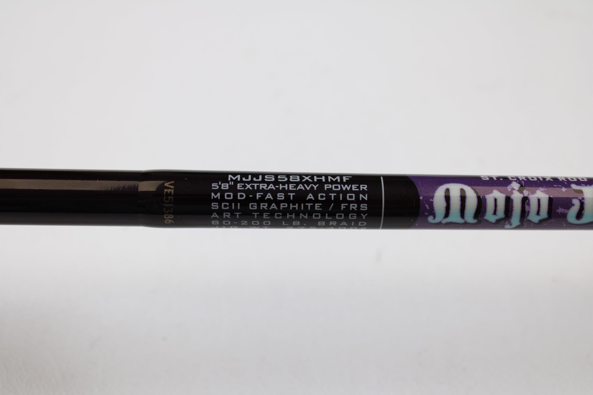 Close-up of a St. Croix Mojo Jig MJJS58XHMF 5'8" Extra-Heavy Mod-Fast spinning rod (used, mint). SCII Graphite/FRS, ART Technology, 80-200 lb. braid—perfect for your next rod and reel trade-in or quality used gear search.