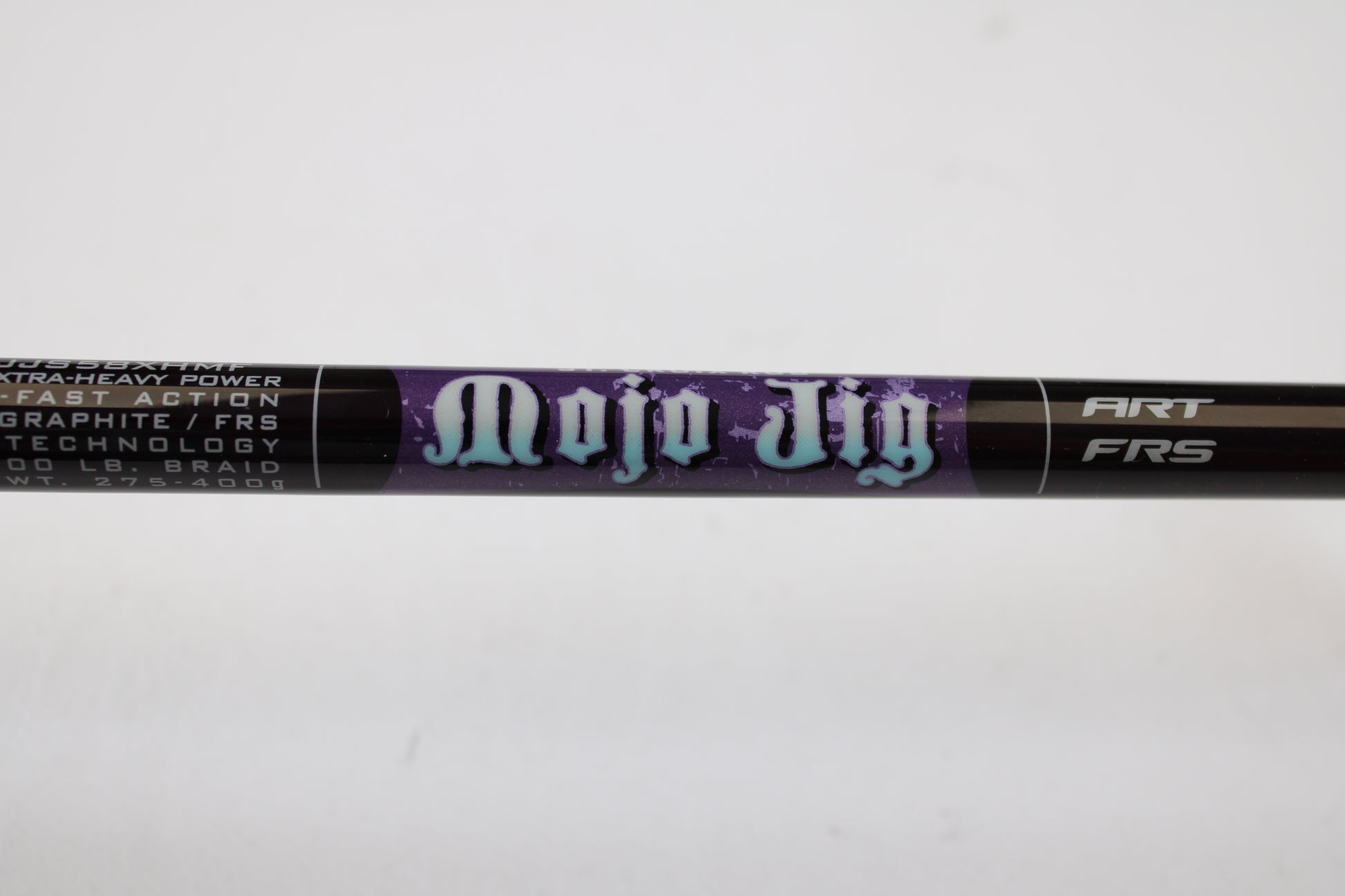 Close-up of a St. Croix Mojo Jig MJJS58XHMF 5'8" XH spinning rod in mint condition—ideal for upgrading or using store credit with our rod and reel trade-in program.