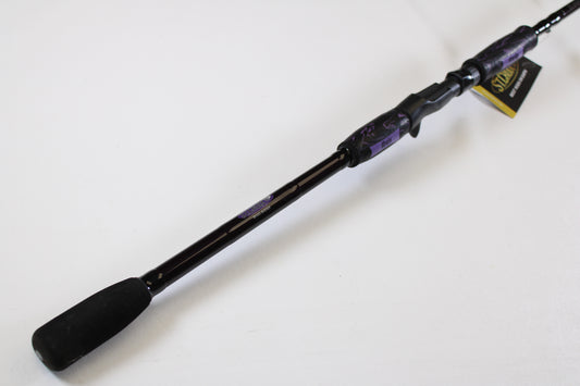 A close-up of a St. Croix Mojo Musky MJM80MHF 8'0" Medium Heavy used casting rod in mint condition is shown against a white background—perfect for those seeking quality gear or trading in with the Rod and Reel Trade-In Program.