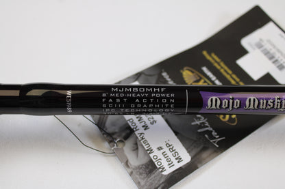 A close-up of a St. Croix Mojo Musky MJM80MHF 8'0" Medium Heavy Casting Rod in mint condition, ideal for anglers joining our Rod and Reel Trade-In Program. Brand tag visible in the background.