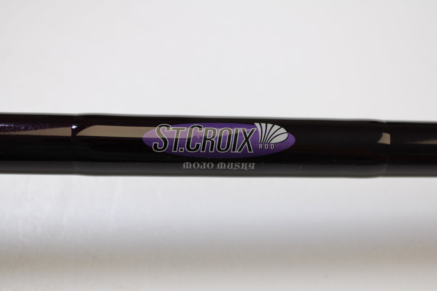 Close-up of a St. Croix Mojo Musky MJM80MHF 8'0" Medium Heavy Used Casting Rod in mint condition—ideal for anglers upgrading with our Rod and Reel Trade-In Program.