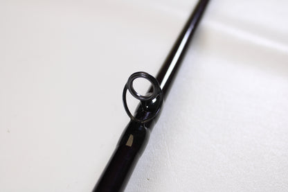 Close-up of a guide ring on the St. Croix Mojo Musky MJM80MHF 8'0" Medium Heavy Used Casting Rod—mint condition—ideal for those considering our Rod and Reel Trade-In Program or wanting store credit for upgrading gear.