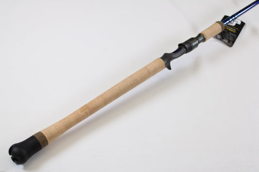 The St. Croix Legend Tournament Inshore ITLC76HMF 7'6" Heavy, a used casting rod in mint condition, features a long cork handle and black reel seat, making it ideal for anglers interested in trade-ins or quality used gear, displayed on a white background.