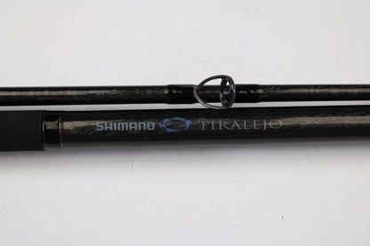 Close-up of the Shimano Tiralejo TRS120MHA Used Spinning Rod in mint condition, with silver and blue branding—ideal for anglers considering an upgrade through our Rod and Reel Trade-In Program.