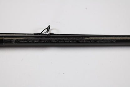 A close-up of a Shimano Tiralejo TRS120MHA Used Spinning Rod (mint), part of our Rod and Reel Trade-In Program, specs: 12'0" length, 30-50 lb line, 1-2 oz lure weight, medium heavy power/moderate fast action—shown on white.
