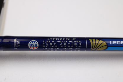 Close-up of a St. Croix Legend Tournament Pike LTPC223HF Slop-N-Tail 7'3" Med Heavy Used Casting Rod (mint) with USA flag and gold shell icon—ideal for our Rod & Reel Trade-In Program or store credit on used gear.