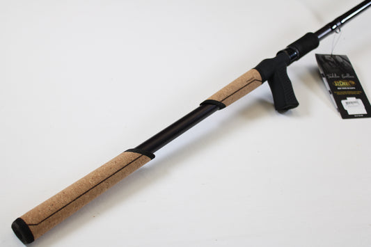 A close-up of the St. Croix Mojo Bass JOC83XXHFT Mag Swimbait 8'3" XXH casting rod handle with cork grips and black reel seat. A product tag is attached, ideal for shoppers considering our rod and reel trade-in program. Mint condition, used item.