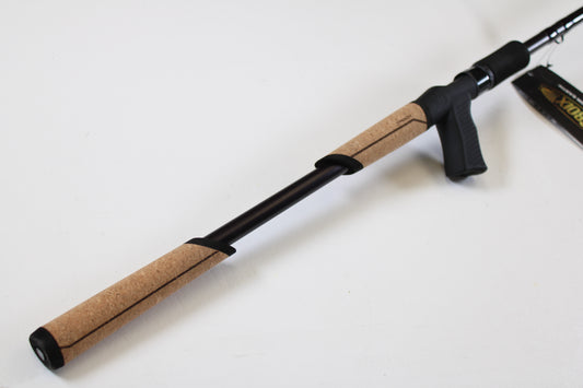 A close-up of the St. Croix Mojo Bass JOC710HF Lite Swimbait 7'10" Heavy Used Casting Rod in mint condition, featuring a cork handle and black accents against a white background. Perfect for our rod and reel trade-in program. Product tag partially visible on right.