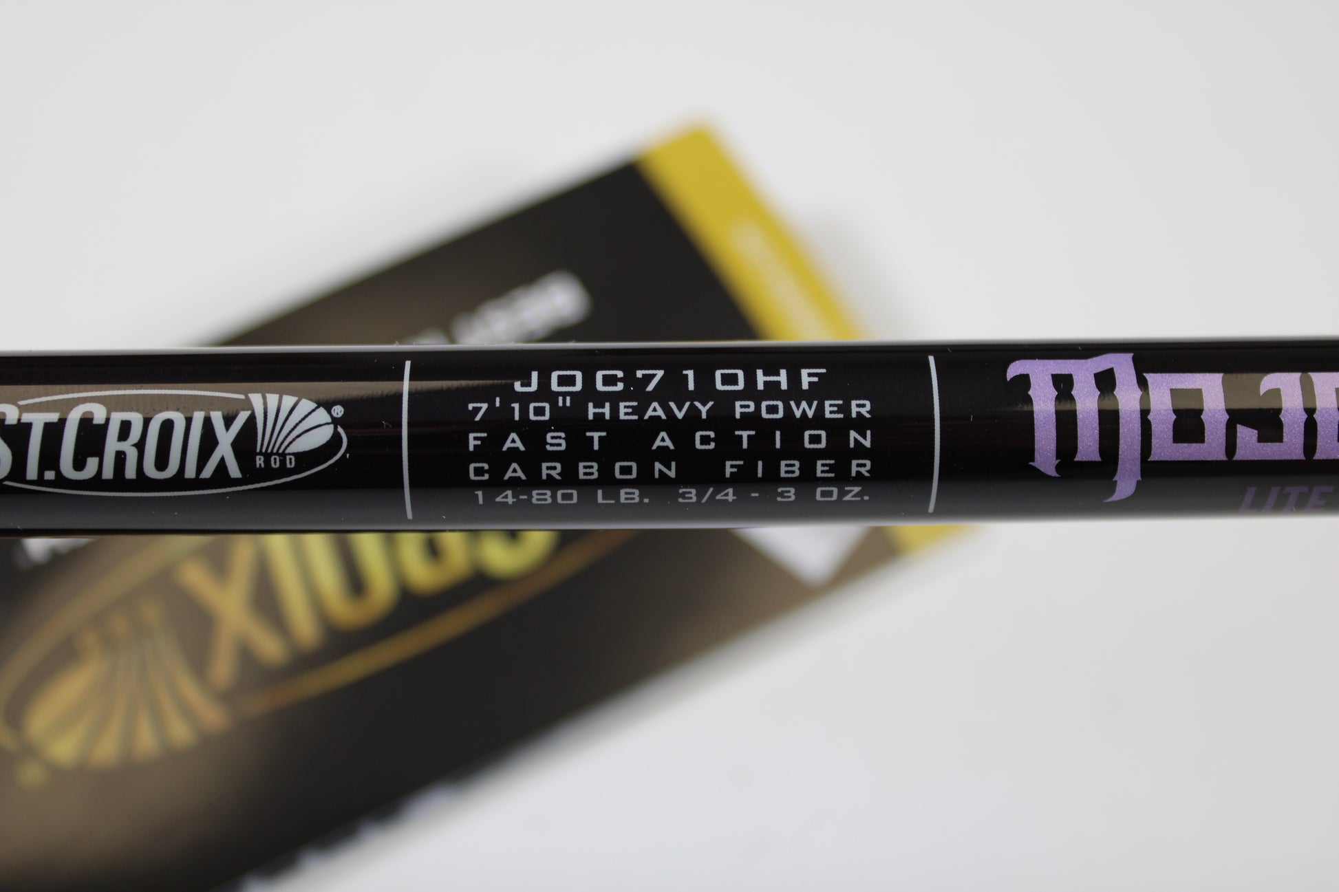 Close-up of a St. Croix Mojo Bass JOC710HF Lite Swimbait 7'10" heavy used casting rod in mint condition—eligible for our used gear or trade-in program. Rated for 14-80 lb line and 3/4–3 oz lures.