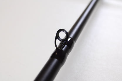 Close-up of the St. Croix Mojo Bass JOC710HF Lite Swimbait 7'10" Heavy Used Casting Rod—mint condition—with a detailed look at the eyelet, perfect for anglers interested in high-quality used St. Croix gear or a rod and reel trade-in for credit.