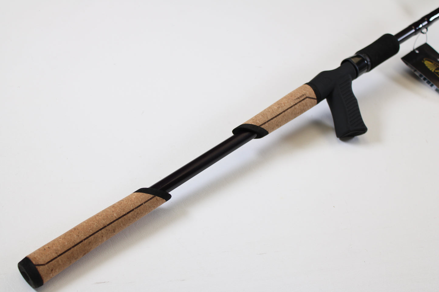 A close-up of the St. Croix Mojo Bass JOC710XHF Mid Swimbait 7'10" XH Used Casting Rod—mint condition, cork handle, and black reel seat—ideal for upgrading through our Rod and Reel Trade-In Program for store credit.