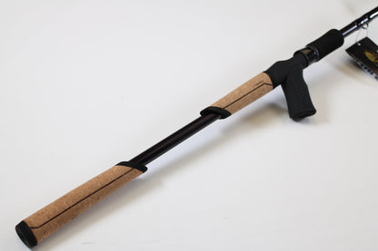 A close-up of the St. Croix Mojo Bass JOC710XHF Mid Swimbait 7'10" XH Used Casting Rod—mint condition, cork handle, and black reel seat—ideal for upgrading through our Rod and Reel Trade-In Program for store credit.