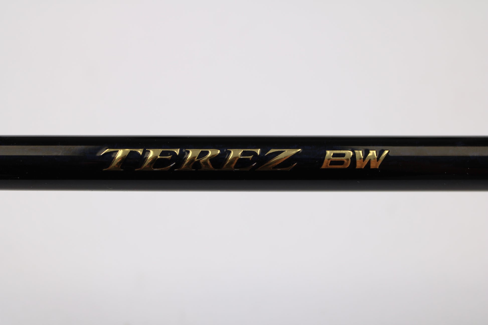 A close-up of a Shimano Terez BW TZBWS72MSBA 7'2" Medium Used Casting Rod in mint condition, with "TEREZ BW" in gold lettering on black, ideal for our rod and reel trade-in program or upgrading to used gear.