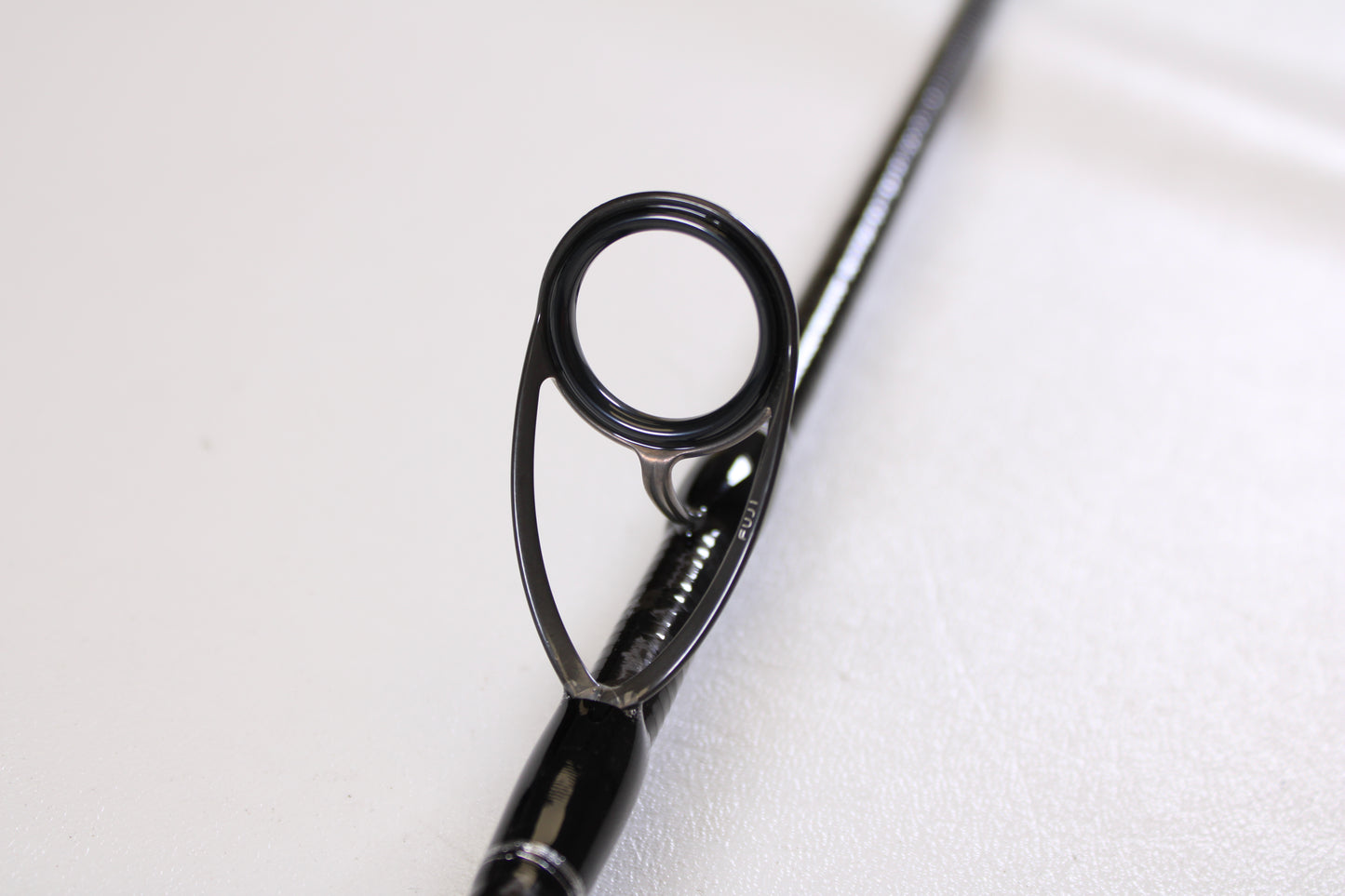 Close-up of a Shimano Terez TZS72XH 7'2" XH used spinning rod guide in mint condition, ideal for anglers upgrading through our Rod and Reel Trade-In Program or buying quality used Shimano gear with store credit.