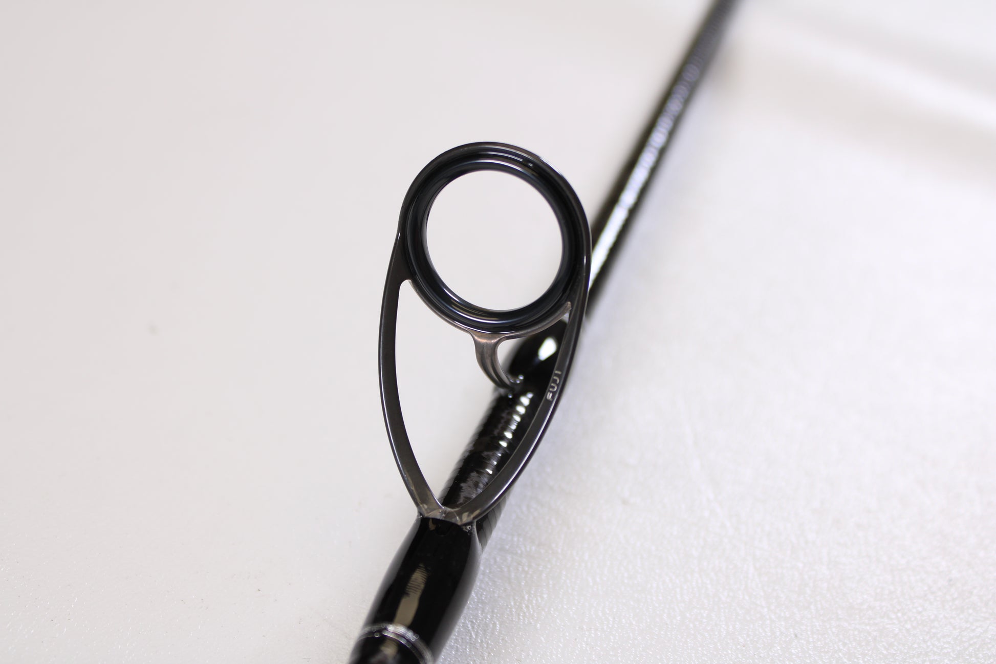 Close-up of a Shimano Terez TZS72XH 7'2" XH used spinning rod guide in mint condition, ideal for anglers upgrading through our Rod and Reel Trade-In Program or buying quality used Shimano gear with store credit.