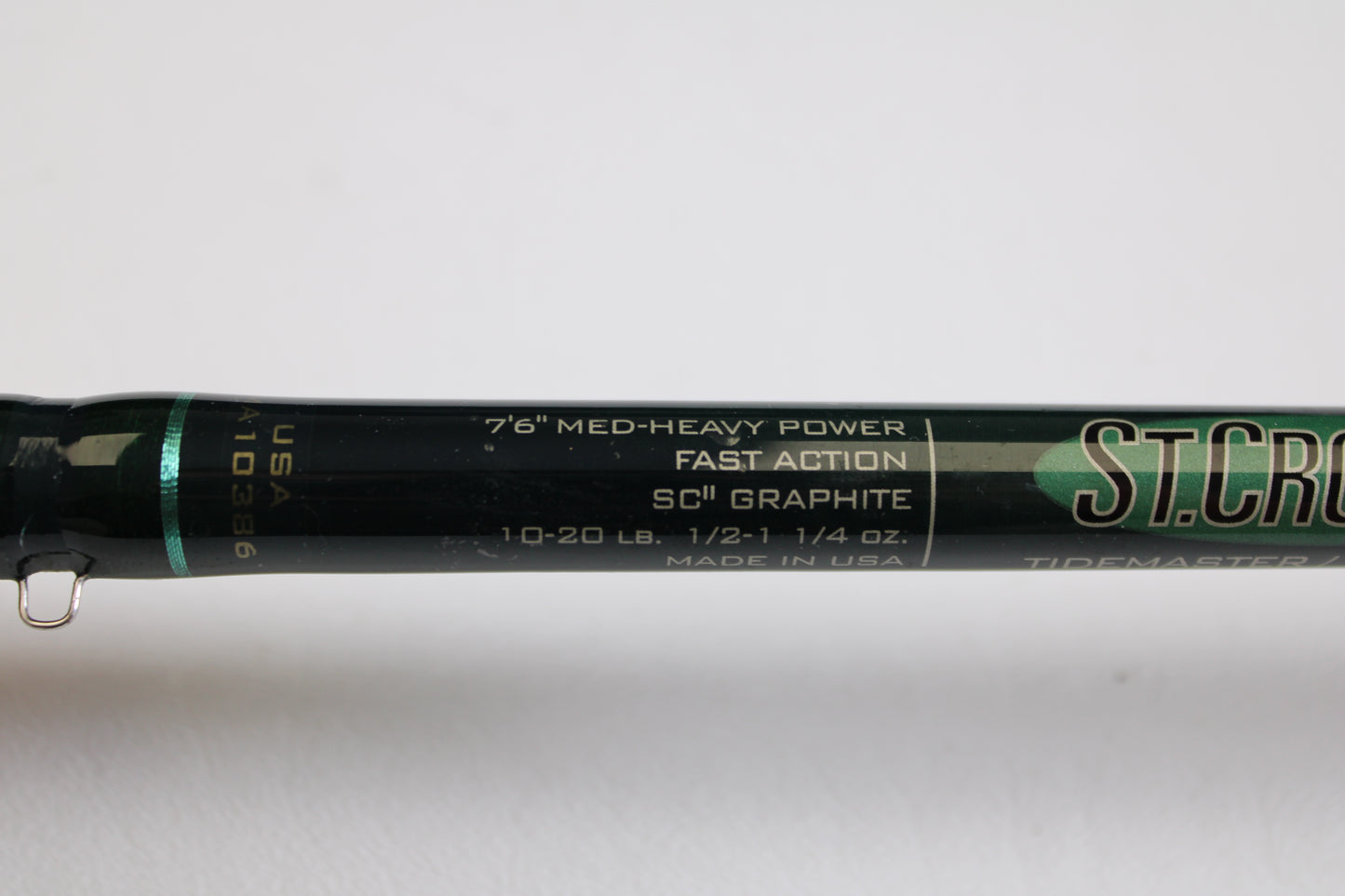 Close-up of a St. Croix Tidemaster Travel TIC76MHF3 7'6" medium-heavy, 3-piece used casting rod in excellent condition—ideal for the Rod and Reel Trade-In Program or earning store credit on your used gear.
