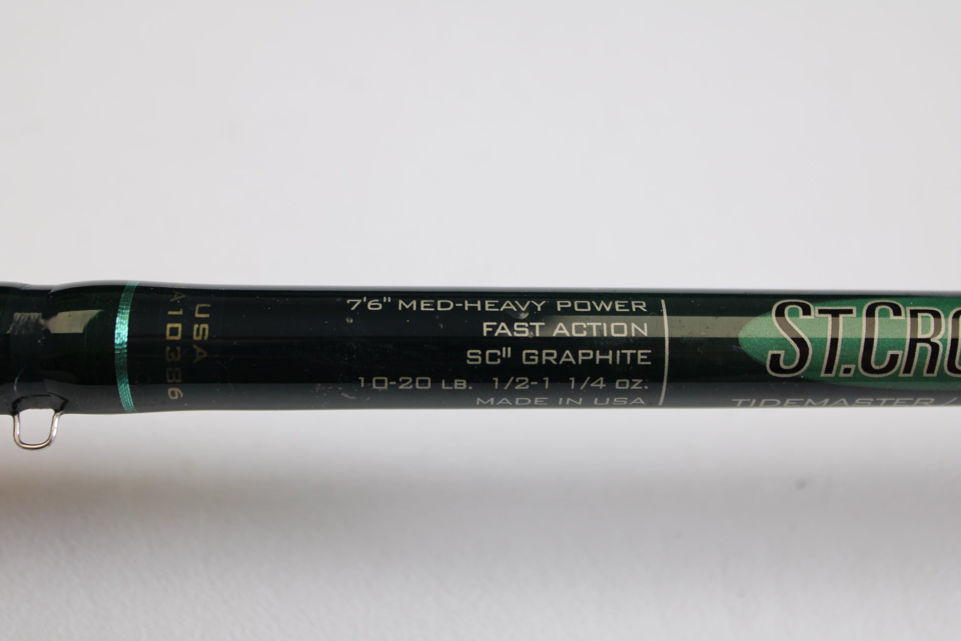Close-up of a St. Croix Tidemaster Travel TIC76MHF3 7'6" medium-heavy, 3-piece used casting rod in excellent condition—ideal for the Rod and Reel Trade-In Program or earning store credit on your used gear.