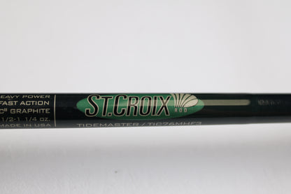 A close-up of a St. Croix Tidemaster Travel TIC76MHF3 7'6" Medium Heavy 3 Piece Used Casting Rod in excellent condition—ideal for those interested in used gear or our Rod and Reel Trade-In Program for store credit.