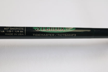 A close-up of a St. Croix Tidemaster Travel TIC76MHF3 7'6" Medium Heavy 3-piece used casting rod in excellent condition—ideal for upgrading through our Rod and Reel Trade-In Program or earning store credit on quality used gear.
