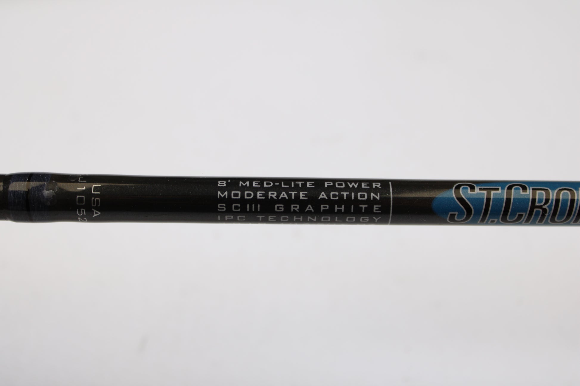 Close-up of a St. Croix Avid AVS80MLM2 8' Medium Light 2-Piece Used Spinning Rod in excellent condition. Ideal for those trading in gear with our Rod and Reel Trade-In Program for store credit.