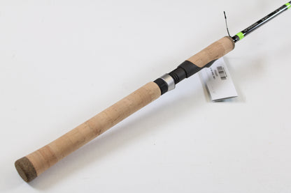 The G. Loomis E6X Walleye 782S WUR 6’6” Medium, a used spinning rod in mint condition with cork handle and dark reel seat, is great for our trade-in program or quality used gear seekers. Shown on white background.