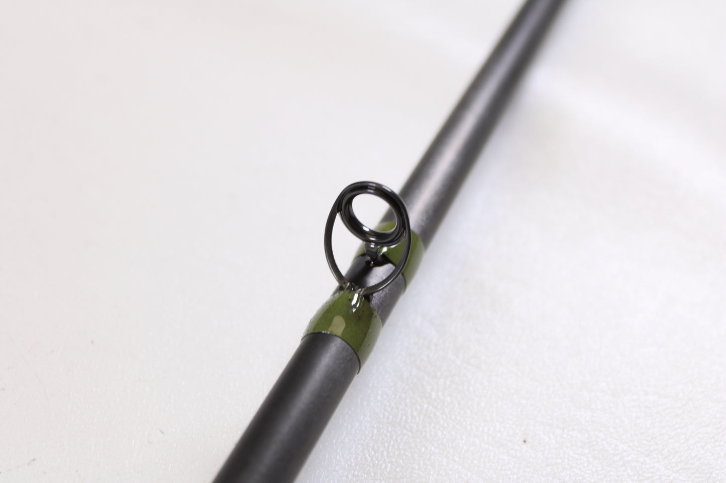 A detailed look at the G. Loomis GCX Salmon 1083-2C SATR 9'0" Medium Heavy Used Casting Rod—Mint Condition—shows quality craftsmanship, ideal for anglers exploring our used gear or rod and reel trade-in program.