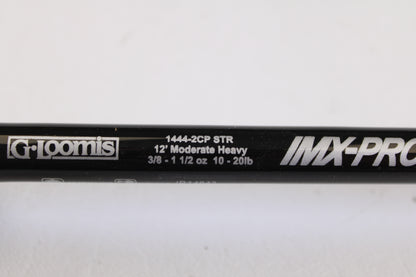 Close-up of a G. Loomis IMX-PRO Steelhead Centerpin 12'0" Heavy 2 Piece Spinning Rod (Used, Mint), with specs in white text. Upgrade now—trade your used gear for store credit with our Rod and Reel Trade-In Program!.