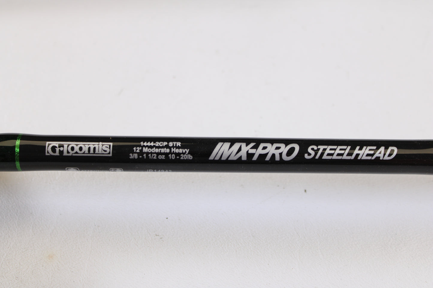 Close-up of a G. Loomis IMX-PRO Steelhead Centerpin 12'0" Heavy 2 Piece used spinning rod in mint condition—perfect for our Rod and Reel Trade-In Program: trade your used gear for store credit!.