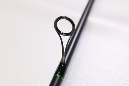 Close-up of a G. Loomis IMX-PRO Steelhead Centerpin 11'4" Medium Light 2 Piece Spinning Rod (Used, Mint Condition), showcasing a metal line guide—ideal for our Rod and Reel Trade-In Program if you’re upgrading your gear.