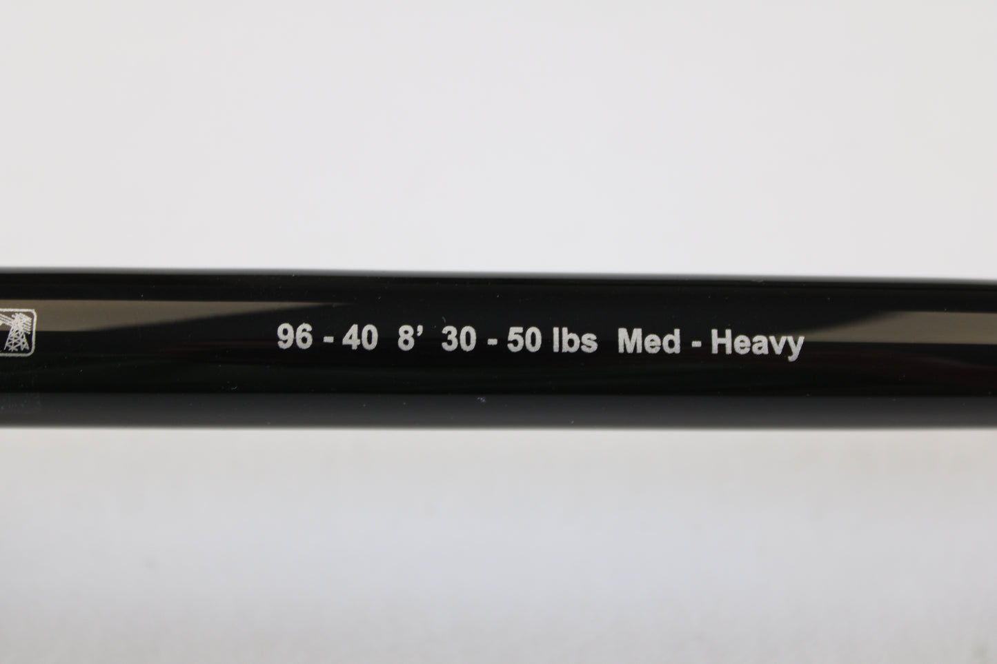 Close-up of a G. Loomis IMX-PRO Offshore 96-40 8'0" Medium Heavy Used Casting Rod in mint condition, ideal for those interested in store credit through our rod and reel trade-in program or seeking top-quality used gear.