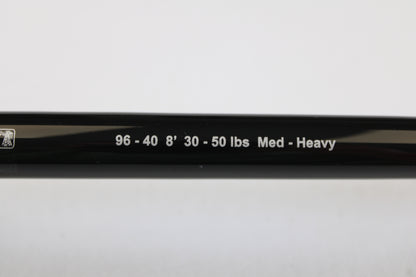 Close-up of a G. Loomis IMX-PRO Offshore 96-40 8'0" Medium Heavy Used Casting Rod in mint condition, ideal for those interested in store credit through our rod and reel trade-in program or seeking top-quality used gear.