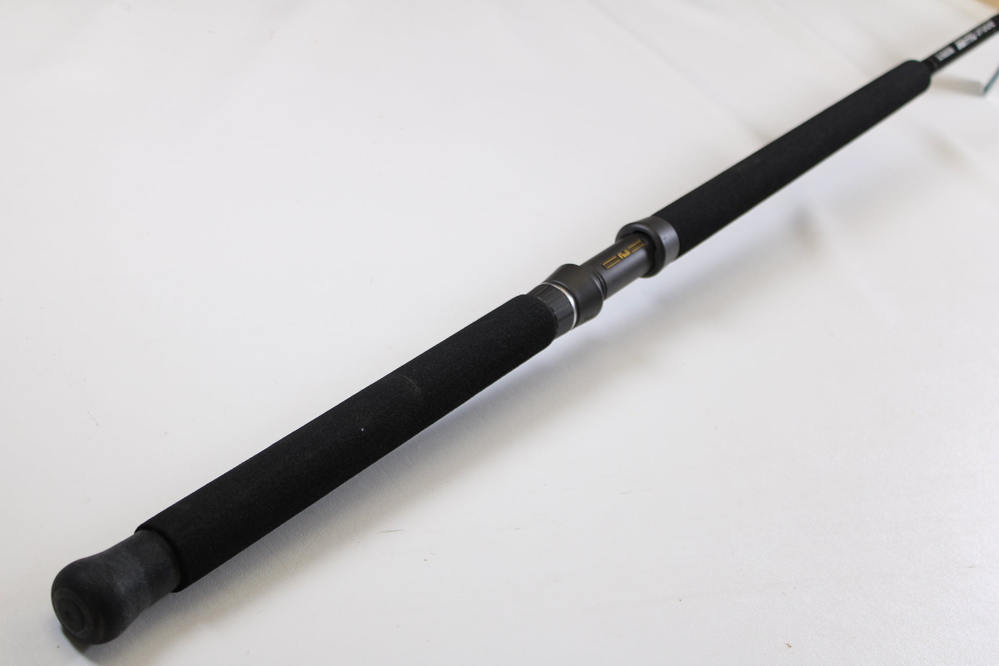 A close-up of the G. Loomis IMX-PRO Offshore 96-50 8'0" Heavy Used Casting Rod in mint condition—perfect for your next rod and reel trade-in to earn store credit on used G. Loomis gear.