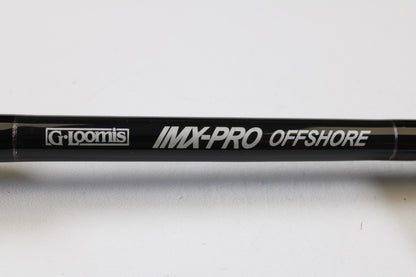 Close-up of a G. Loomis IMX-PRO Offshore 96-50 8'0" Heavy used casting rod in mint condition—perfect for anglers looking to upgrade via our rod and reel trade-in program or earn store credit on used gear.