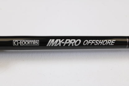 Close-up of a G. Loomis IMX-PRO Offshore 96-20 8'0" Medium Light Used Casting Rod in mint condition, ideal for customers upgrading with our Rod and Reel Trade-In Program for store credit.