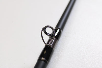 Close-up of the G. Loomis IMX-PRO Offshore 96-30 8'0" Medium Used Casting Rod in mint condition—ideal for anglers considering our Rod and Reel Trade-In Program.