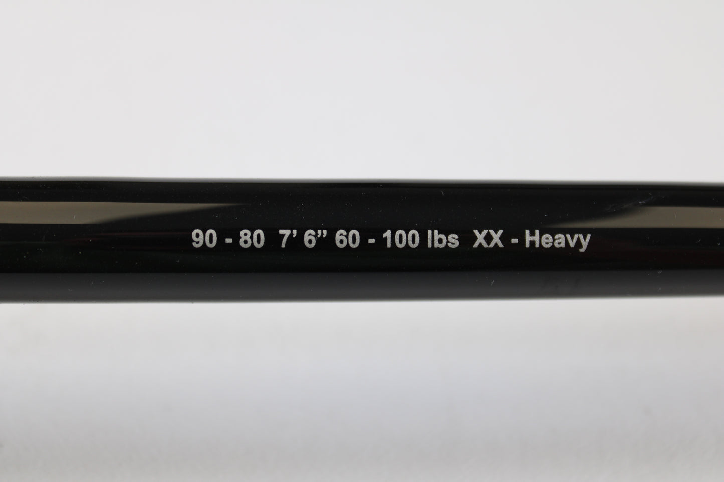 A close-up of a G. Loomis IMX-PRO Offshore 90-80 7'6" XXH Used Casting Rod, mint condition, from our used gear collection. Trade in your rod for store credit through our Rod and Reel Trade-In Program.
