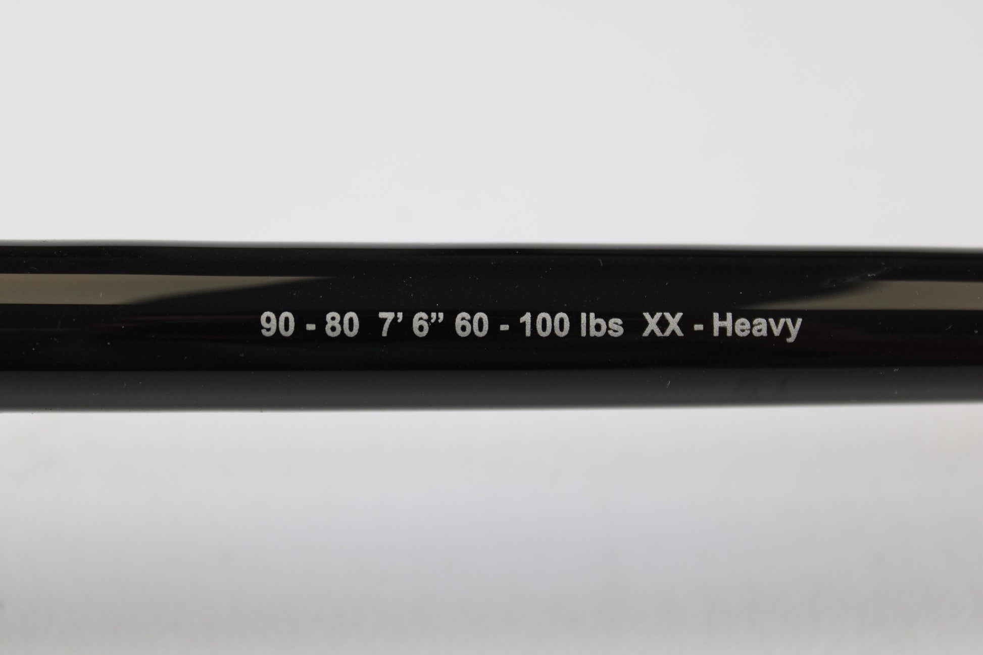 A close-up of a G. Loomis IMX-PRO Offshore 90-80 7'6" XXH Used Casting Rod, mint condition, from our used gear collection. Trade in your rod for store credit through our Rod and Reel Trade-In Program.
