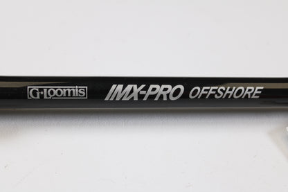 Close-up of a G. Loomis IMX-PRO Offshore 90-60 7'6" XH Used Casting Rod in mint condition, ideal for anglers seeking quality used gear or those interested in our rod and reel trade-in program.
