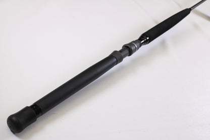 A close-up of the Shimano Terez BW TZBWC70MSBA 7'0" Medium Used Casting Rod’s black foam handle, shown in mint condition against a white background—ideal for our rod and reel trade-in program.