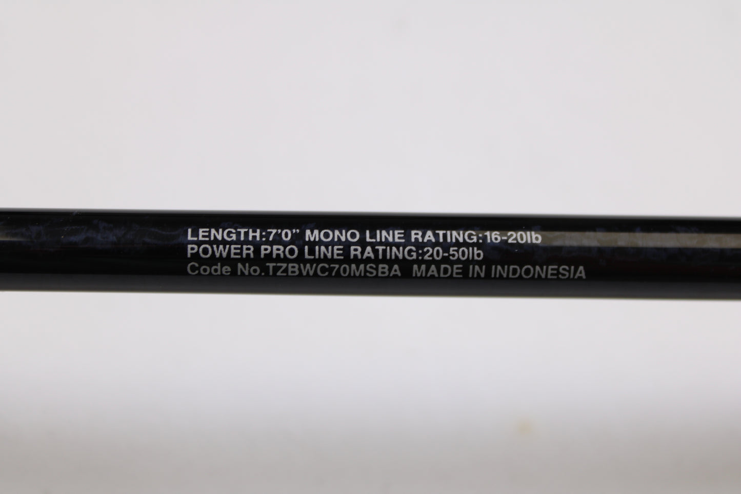 Close-up of the Shimano Terez BW TZBWC70MSBA 7'0" Medium Casting Rod, used in mint condition. Specs: mono line 16-20 lb, power pro 20-50 lb. Perfect for our rod and reel trade-in—swap your gear for store credit! Made in Indonesia.