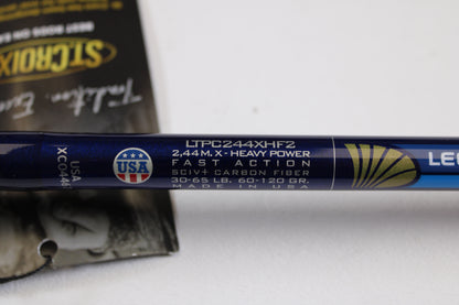 Close-up of a St. Croix Legend Tournament Pike LTPC244XHF2 8'0" X-Heavy, Fast Action 2-piece casting rod in mint condition, with gold detailing and USA logo. Eligible for trade-in—get store credit for your used gear!.