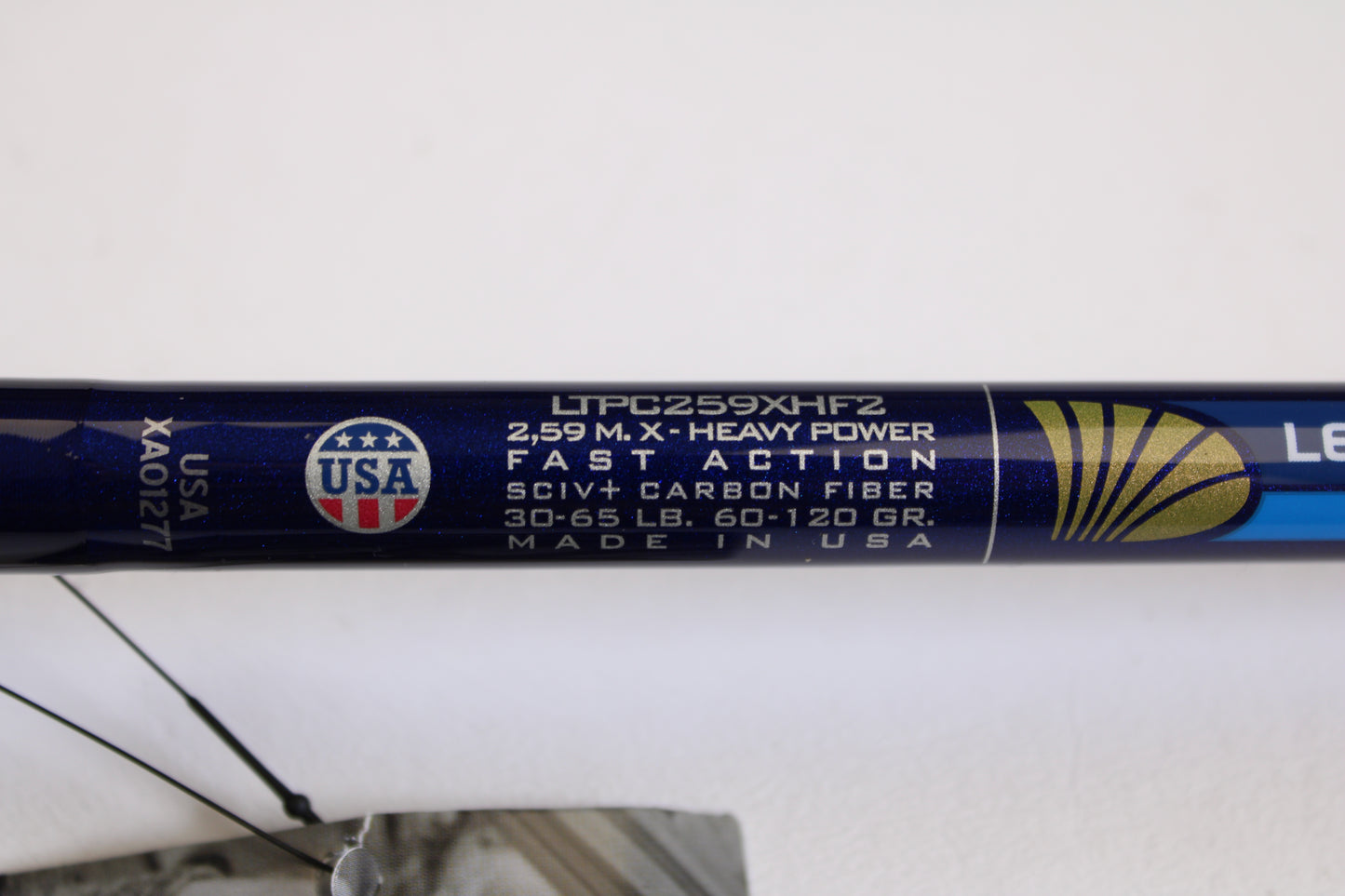 Close-up of a St. Croix Legend Tournament Pike LTPC259XHF2 Big Shad Swimbait 8'6" XH casting rod label: "2.59m, X-Heavy, Fast Action, SCIV+ Carbon Fiber, 30-65lb, 60-120gr." USA flag emblem, “Made in USA.” Eligible for Rod & Reel Trade-In Program.