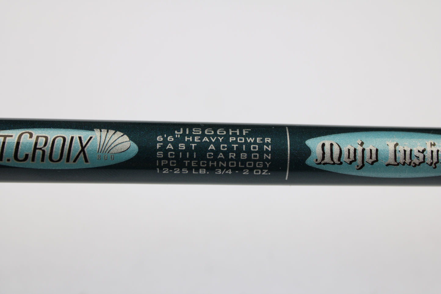 Close-up of a St. Croix Mojo Inshore JIS66HF 6'6" Heavy Used Spinning Rod in mint condition. Trade in your used gear through our Rod and Reel Trade-In Program to earn store credit for your next upgrade!.