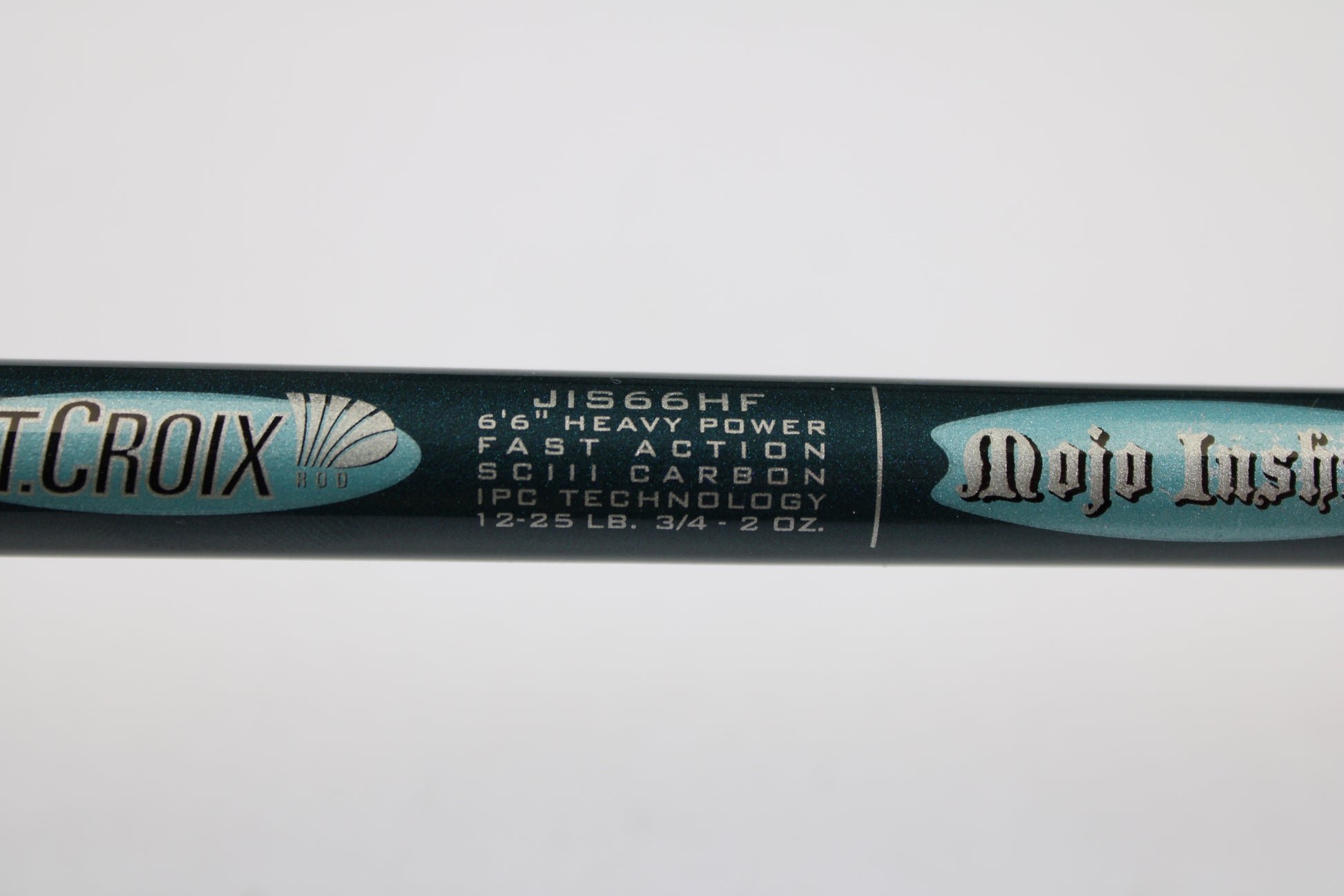 Close-up of a St. Croix Mojo Inshore JIS66HF 6'6" Heavy Used Spinning Rod in mint condition. Trade in your used gear through our Rod and Reel Trade-In Program to earn store credit for your next upgrade!.