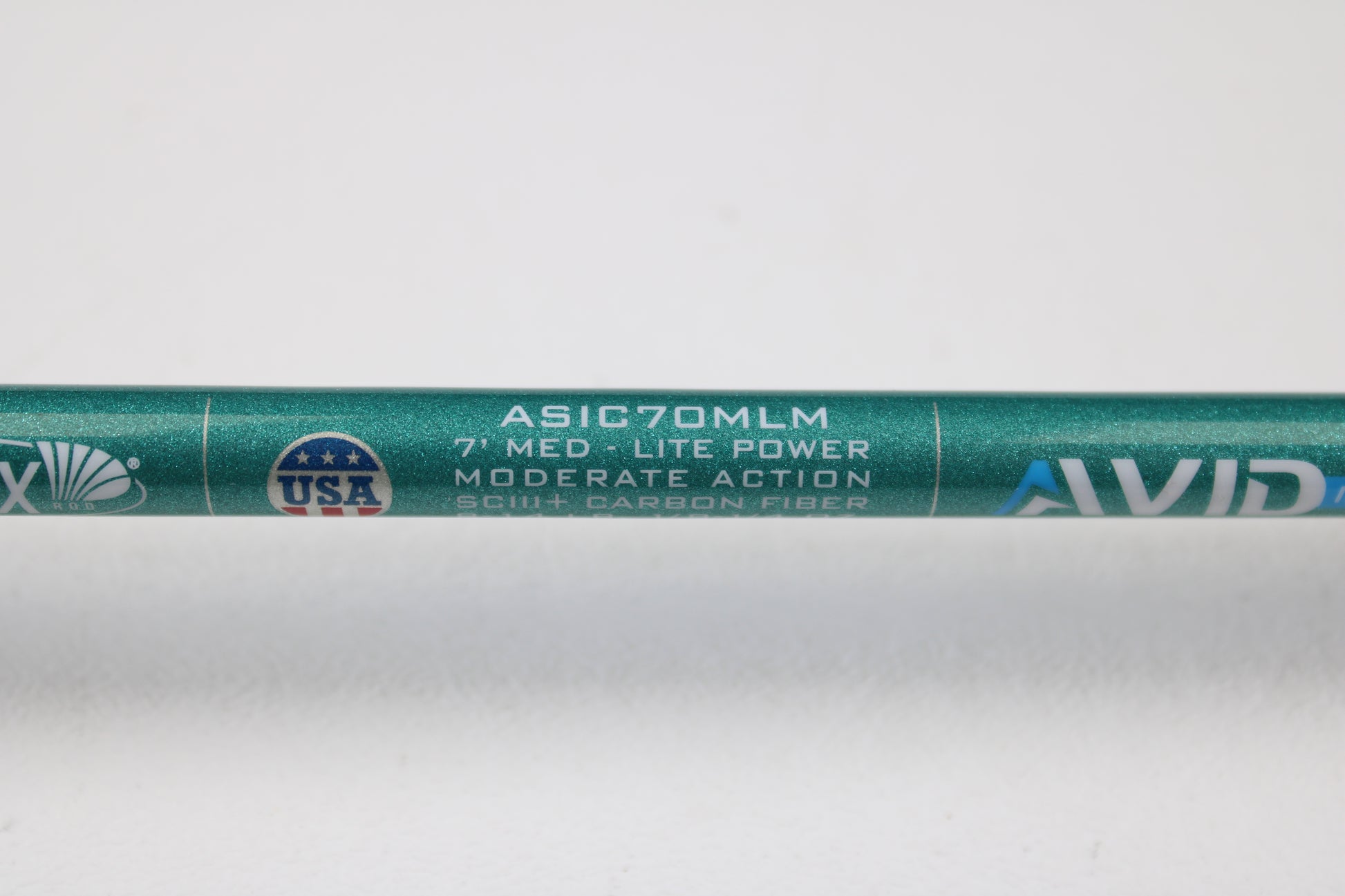 Close-up of a St. Croix Avid Inshore ASIC70MLM 7'0" Medium Light Used Casting Rod—mint condition, eligible for Rod and Reel Trade-In Program. Features SCIII + carbon fiber construction. Perfect used gear for store credit!.
