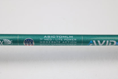 Close-up of a St. Croix Avid Inshore ASIC70MLM 7'0" Medium Light Used Casting Rod—mint condition, eligible for Rod and Reel Trade-In Program. Features SCIII + carbon fiber construction. Perfect used gear for store credit!.