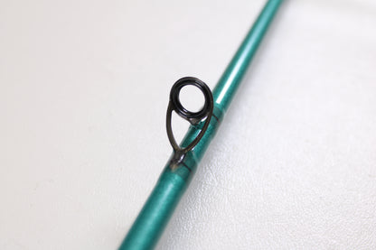 Close-up of a St. Croix Avid Inshore ASIC76MLM 7'6" Medium Light Used Casting Rod in mint condition, showcasing its black line guide—perfect for upgrading your gear or trading in your old rod for store credit.